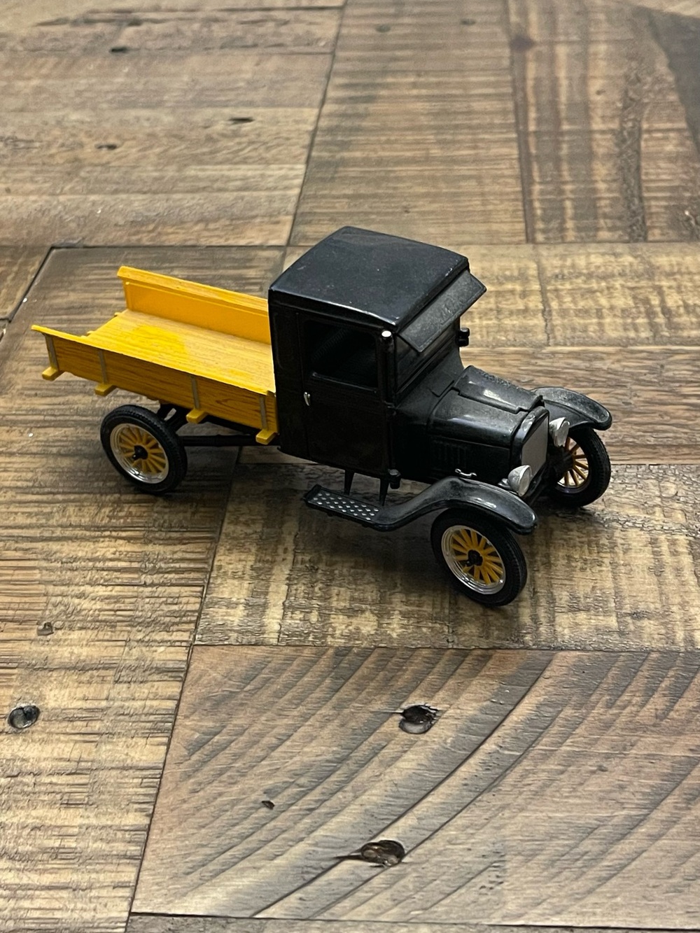 1:32 scale diecast model of a 1923 Ford Model TT truck